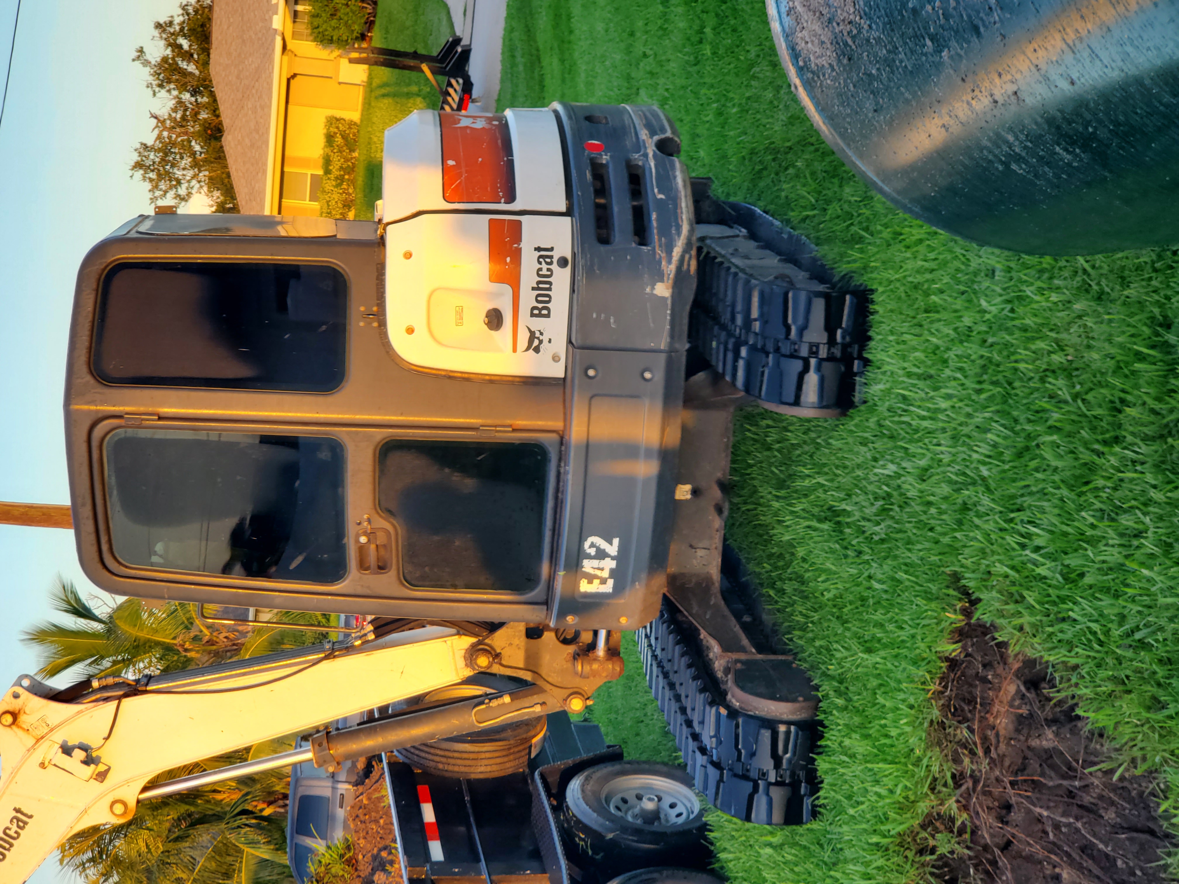 Retro excavator Installing A Propane Tank Underground